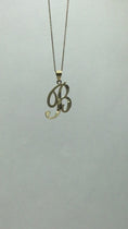 Load and play video in Gallery viewer, Solid Gold Cursive Initial Pendant - 10k or 14k