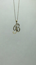Load and play video in Gallery viewer, Solid Gold Cursive Initial Pendant - 10k or 14k
